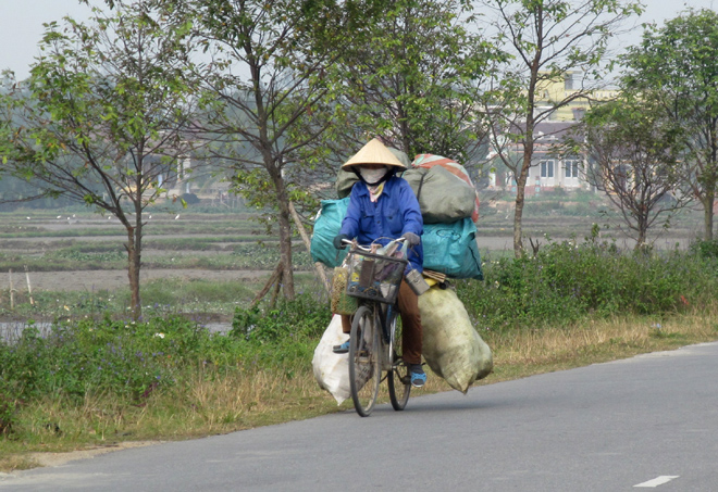 вьетнамка на велосипеде